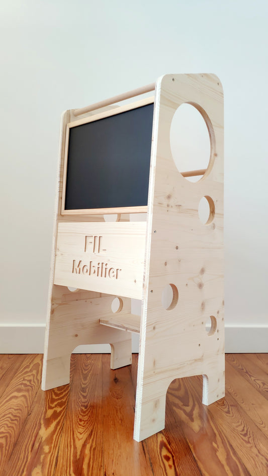 Adjustable Montessori-inspired learning tower with removable board