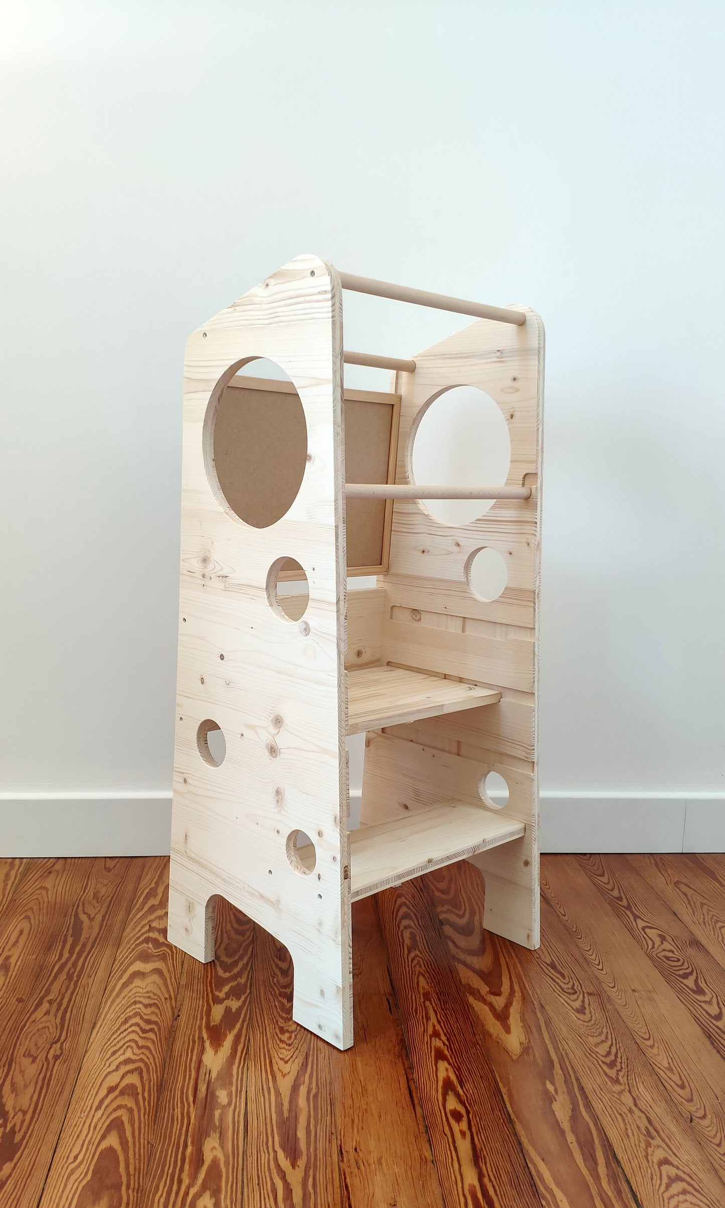 Adjustable Montessori-inspired learning tower with removable board
